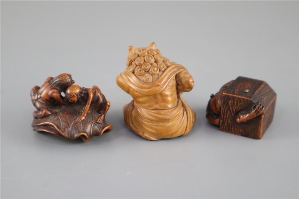 Three Japanese boxwood or cherry netsuke of oni, Meiji period,